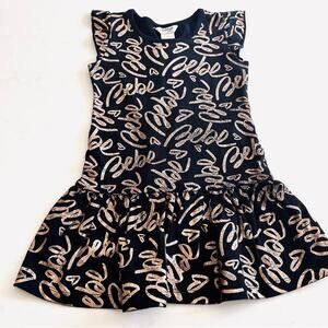 Bebe girls black jersey dress with gold Bebe words throughout size 4